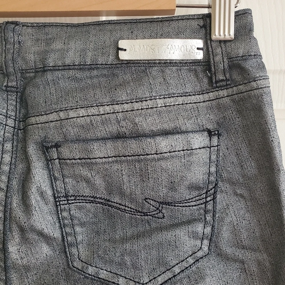 Almost Famous Metalic coated jeans size 3